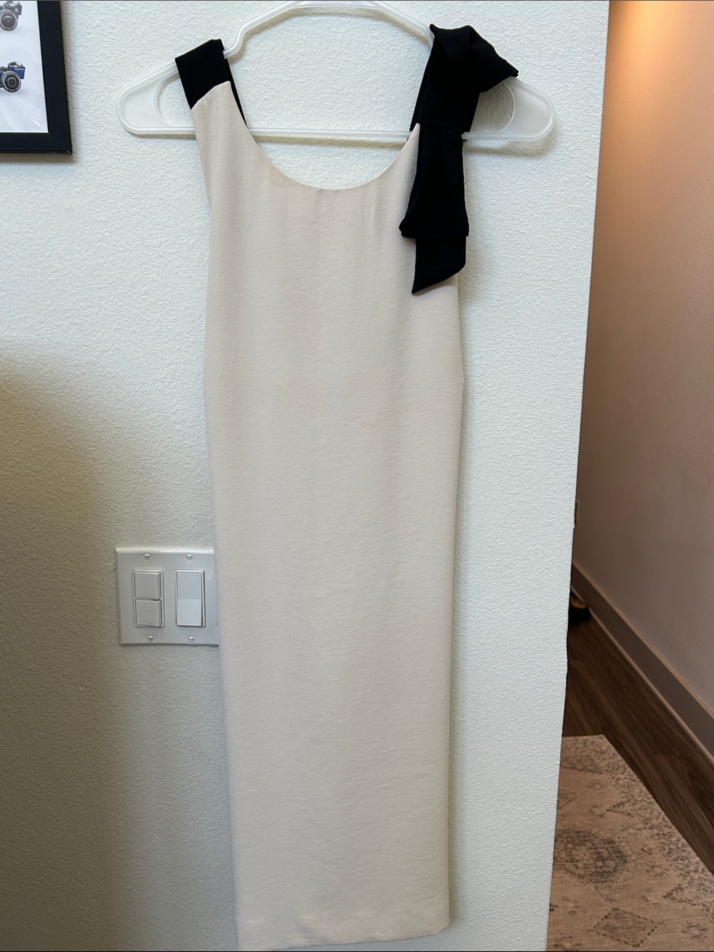 Elegant Cream Mini Dress with Black Shoulder Bow Detail